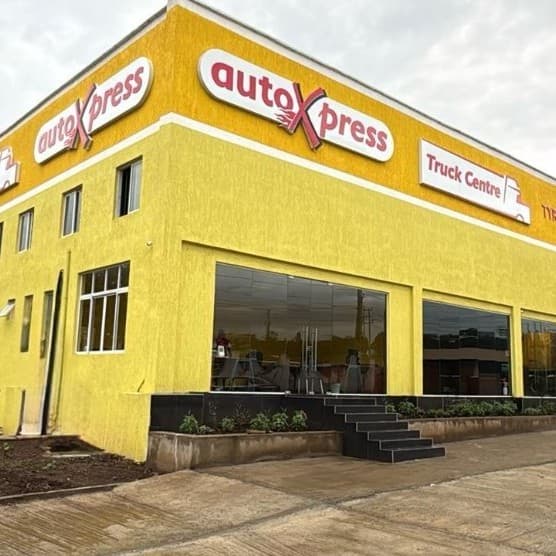 A yellow building with a sign on the front AI-generated content may be incorrect_